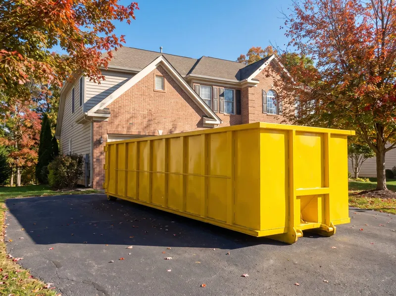 30-yard roll-off dumpster in a Yonkers driveway